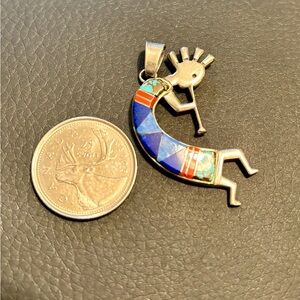 Calvin Begay Kokopelli pendant.